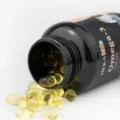 HEKA Kids Omega-3 jar with softgels spilling out